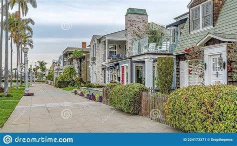 Pano Exterior Of Charming Homes In Long Beach California On Palm Tree