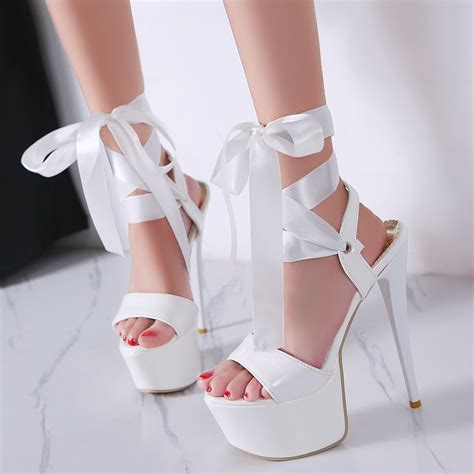 white stiletto high heels with ribbon lace ups