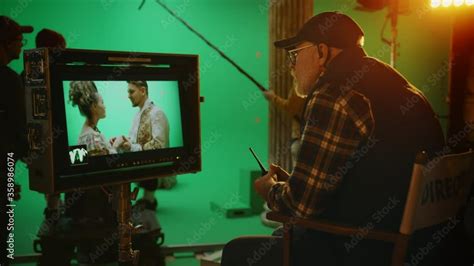 Director Looks At Display Controls Shooting History Movie Green Screen