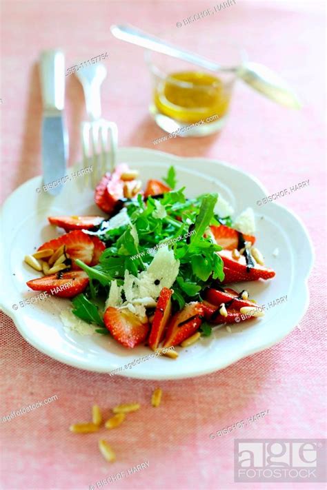 Rocket Salad With Strawberries Parmesan Balsamic Vinegar And Pine