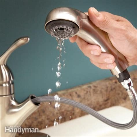 The kitchen sink sprayer offers a dribble where once there was a spray. Slow Running Water: Unclog the Aerator | The Family Handyman