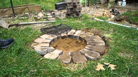 This fire pit has been made using heat resistant painted steel. How To Make A Cheap Fire Pit | Fire Pit Design Ideas