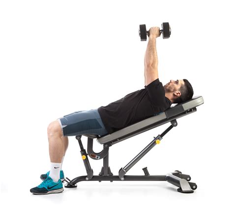 Lie down on an incline bench. Incline dumbbell press - healthinindia.in