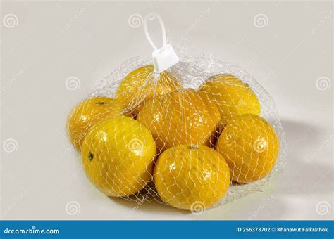 Oranges In A Net Bag Stock Photo Image Of Yellow Fresh 256373702