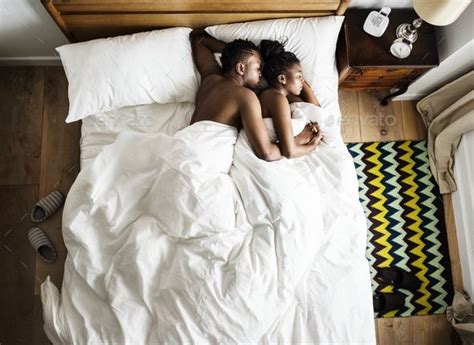 African Descent Couple Sleeping On The Bed Snuggling And Hugging Couple Sleeping Couple Bed