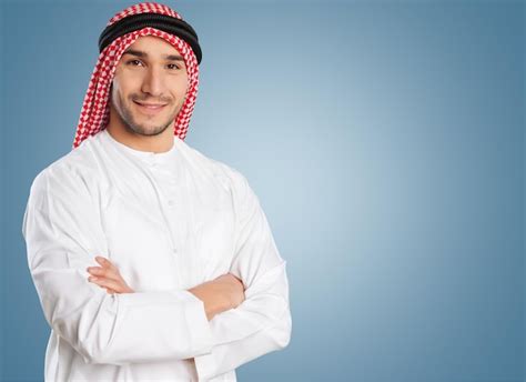 Premium Photo Arab Man Posing Happy With Folded Arms Isolated On A