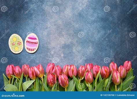 Easter Decoration And Pink Tulips On Blue Background Easter Concept