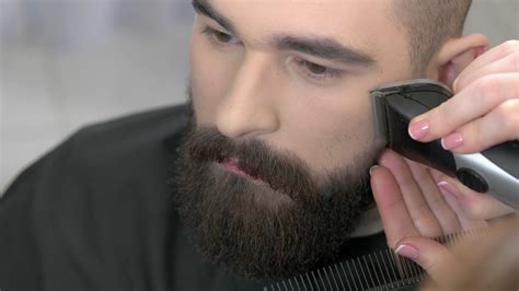 Beard Grooming Process Close Up Barber Using Trimmer And Comb Stock Video Footage 0014 Sbv
