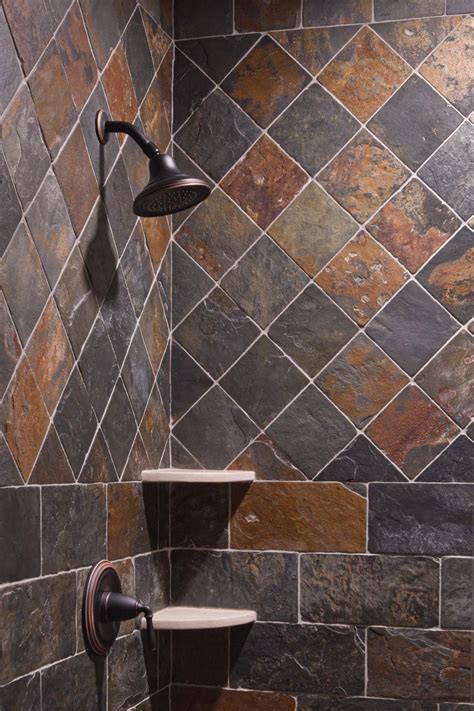 Slate blue powder room walls complement a marble and brass washstand fixed against an oak herringbone pattern floor and beneath a capiz mirror lit by brass sconces with white shades. Pin by Therese Cargill on Bathrooms | Rustic bathroom ...