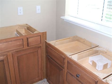 (labor only) hiring someone to hang cabinets should cost about $44.71 per box. Kitchen cabinet installer and measurement service