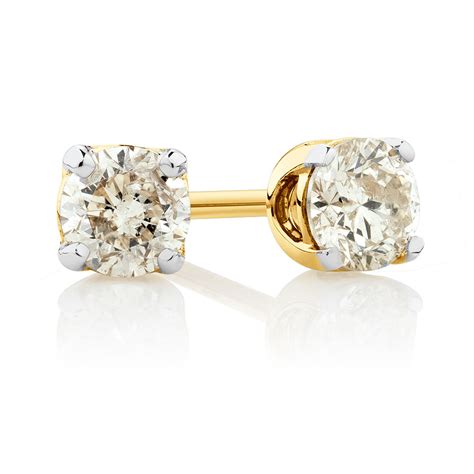 Stud Earrings With 0 30 Carat TW Of Diamonds In 10ct Yellow Gold