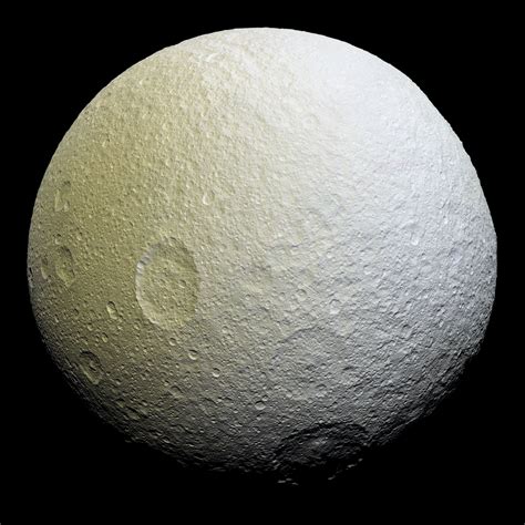 Cassini Reveals Unusual Red Arcs On Saturns Moon Tethys
