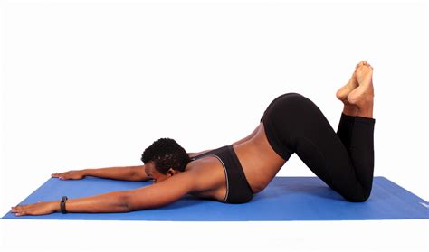 Fir Woman Doing Yoga Pose On Yoga Mat