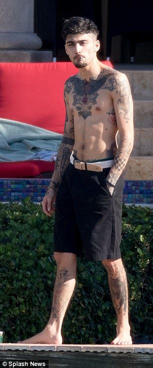 Shirtless Zayn Malik Shows Off His Heavily Inked Torso Daily Mail Online