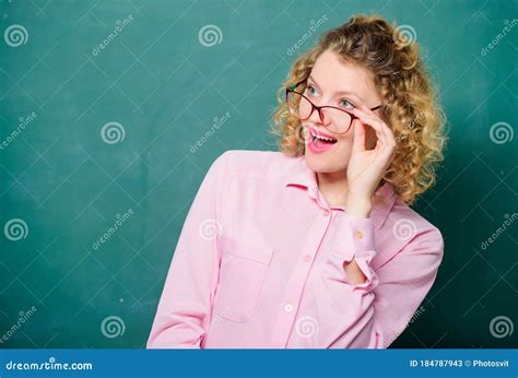 playful teacher woman school teacher shy and pretty lady wear eyeglasses chalkboard background