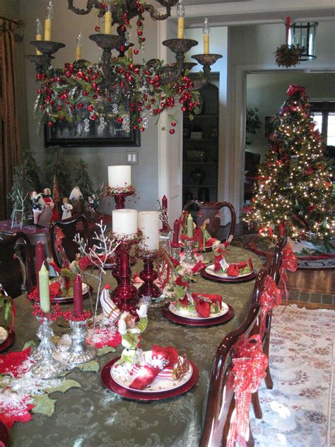 The table setting includes gold chargers, layered with white plates and green plaid napkins tied with natural jute string. My Christmas table...red, white and green | Christmas ...