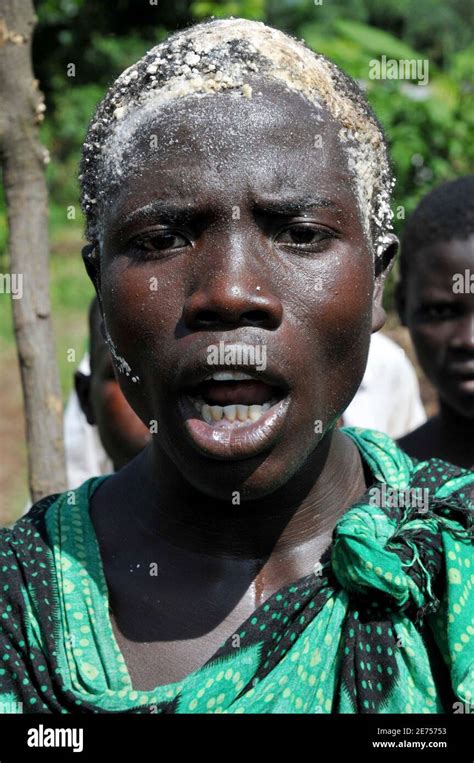 Ronald Makwankwa An Initiate From The Bagisu Tribe Is Smeared With Maize Flour During His