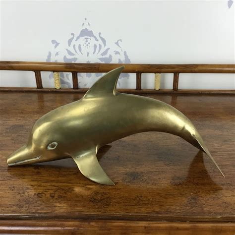 Brass Dolphin Circa Who