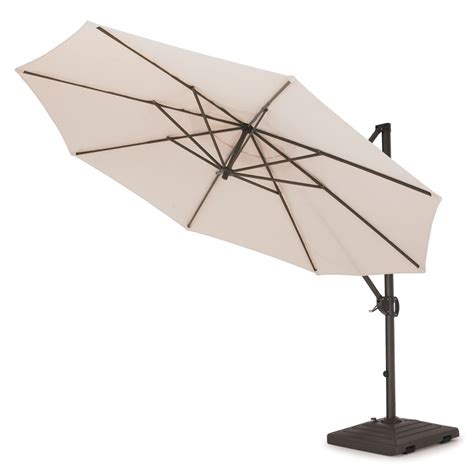 The Effortless Adjustable Cantilever Umbrella Hammacher Schlemmer