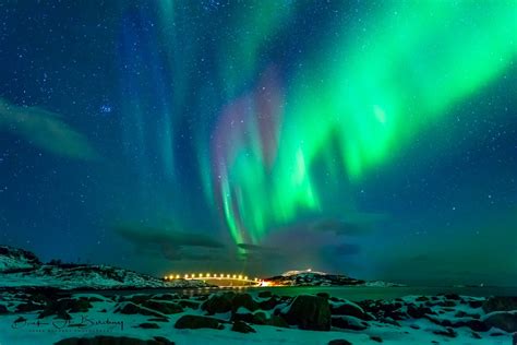 Brilliant Aurora Borealis Over Arctic Beach At Sommaroy Norway Aurora