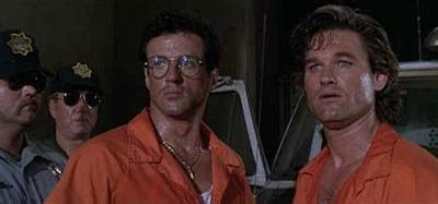 Came in from the city walked into the door i turned around when i heard. «Videa bien, hermanito. Videa bien.»: "Tango y Cash", sociedad (i)limitada.