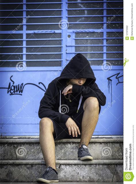 Little Boy Sad Sitting Alone At School Stock Photo Image
