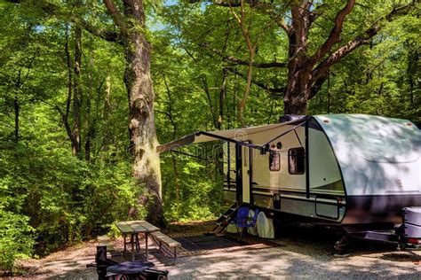 Travel Trailer Camping In The Woods At Starved Rock State Park Stock