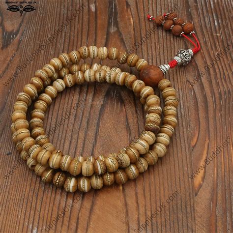 brown multicoloured yak bone mala