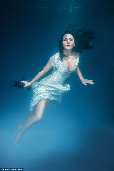 Linzi Stoppard Models Low Cut Black Gown In Emma Jane Lewis Underwater