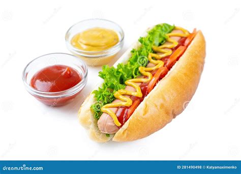Homemade Hot Dog With Mustard Ketchup Tomato And Fresh Salad Leaves