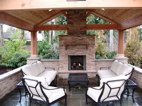 Covered Patio With Gas Fireplace And Blue Stone Outdoor Living Space