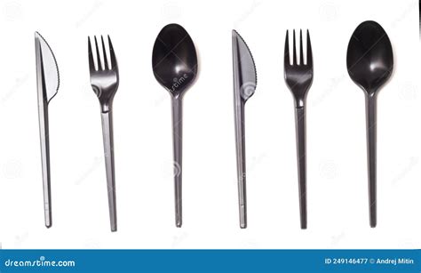Repeating Black Plastic Disposable Knifespoon And Fork Isolated On