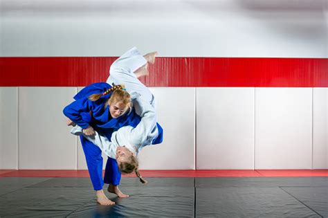 Two Women Fight Judo On Tatami Stock Photo Download Image Now Istock