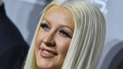 Christina Aguilera Turns Up The Heat In Curve Hugging Grey Top And