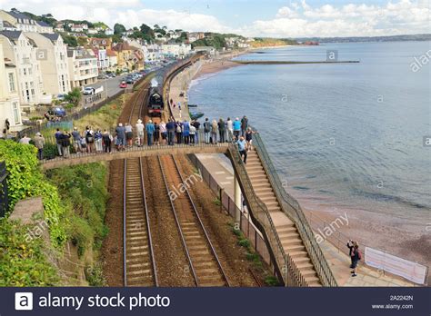 People On A Footbridge Watching The Royal Duchy Rail Tour Passing
