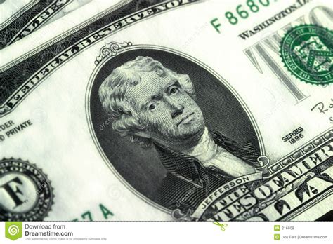 A Close Up Of A 100 Dollar Bill Shows Benjamin Franklin Wearing A Surgical Mask Royalty Free