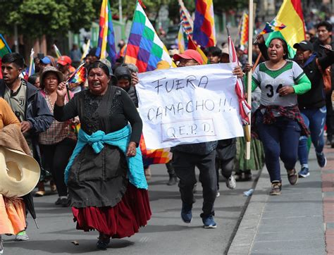 Una Masiva Marcha De Banderas Indígenas Saluda A Evo Morales Desde