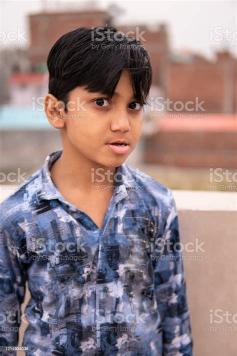 Angry Boy Glaring At The Camera Stock Photo Download Image Now 2 3