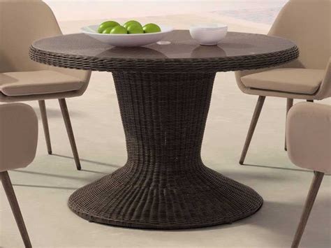 The wicker is woven over a wood frame for stability and durability. Zuo Outdoor Noe Aluminum Wicker 48 Round Glass Top Dining ...