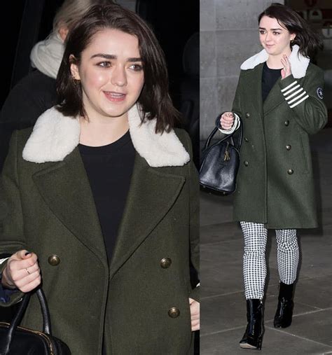 Maisie Williams In Double Breasted Fur Trimmed Coat And Shiny Black Boots