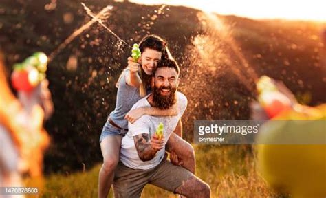 Man Squirt Gun Photos And Premium High Res Pictures Getty Images