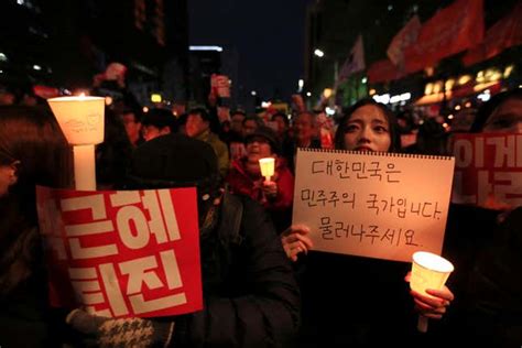 South Korean Protestors Are Demanding President Park Geun Hyes Resignation