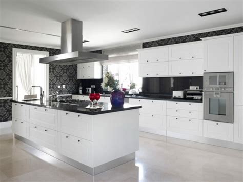 The colorway may be simple, but the special details are plentiful. White kitchen black countertop: ideas and inspiration for ...