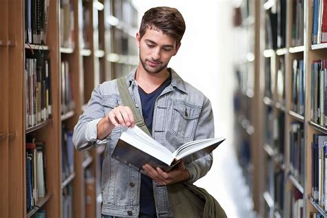Man Holding Book Inside Library Student Books Learn Cc0 Public
