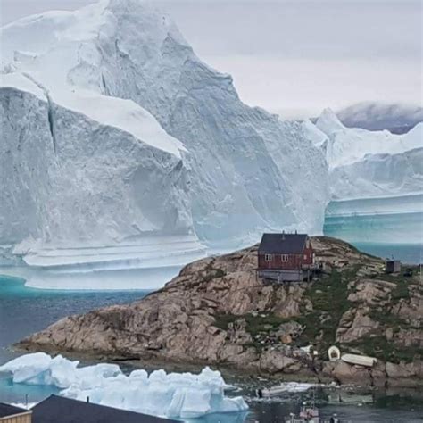 Huge Iceberg Drifts Near Greenland Village Sparking Fears Of A Tsunami