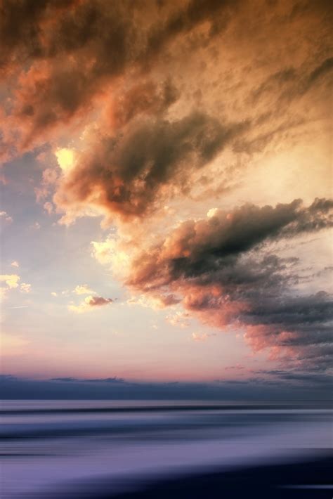 Calm Sea Under Cloudy Sky At Daytime Photo Free Image On Unsplash