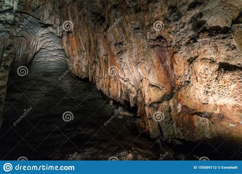 Stone Waterfall Rock Formation And Stalactites Inside The Cave Stock