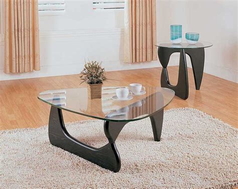 While choosing a coffee table may feel like both an overwhelming and an unsexy task, there are things to consider — beyond your overall aesthetic — to for a modern look, interior designer elizabeth stuart also favors plexiglass, and she recommends this coffee table originally manufactured by minotti. Modern coffee table Noguchi | Contemporary