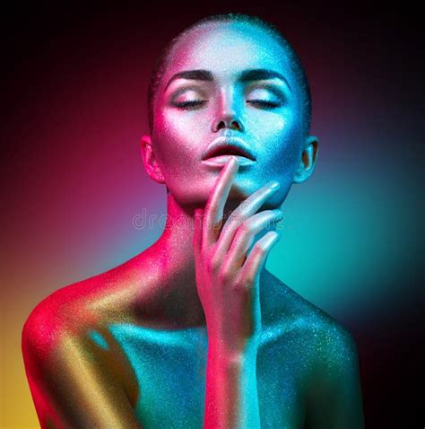 Fashion Model Woman In Colorful Bright Sparkles And Neon Lights Posing
