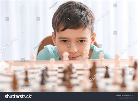 Little Boy Playing Chess During Tournament Stock Photo 2147323189